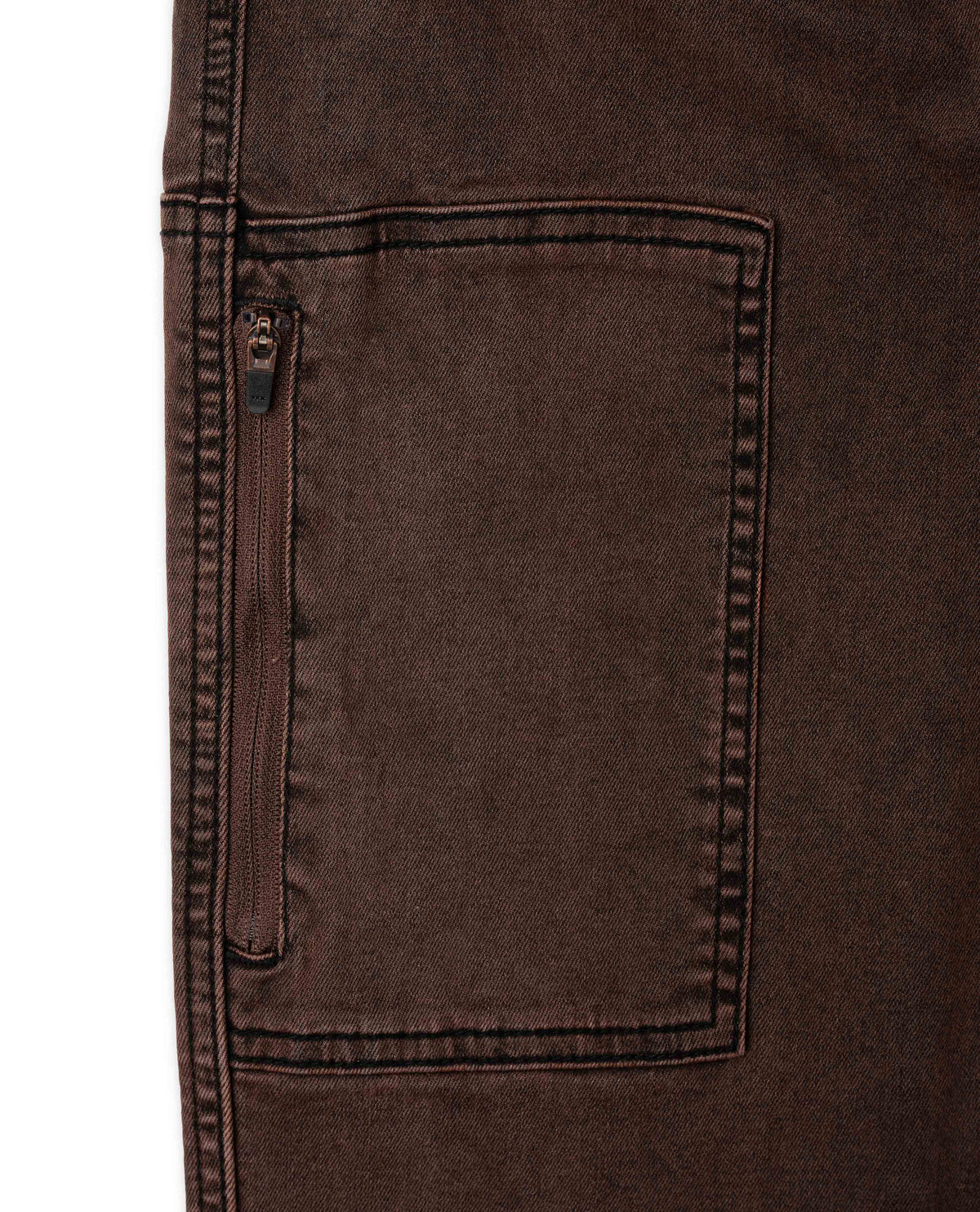 Close-up of a brown pocket on a garment with a white background