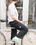Sofia wearing Black utility pants