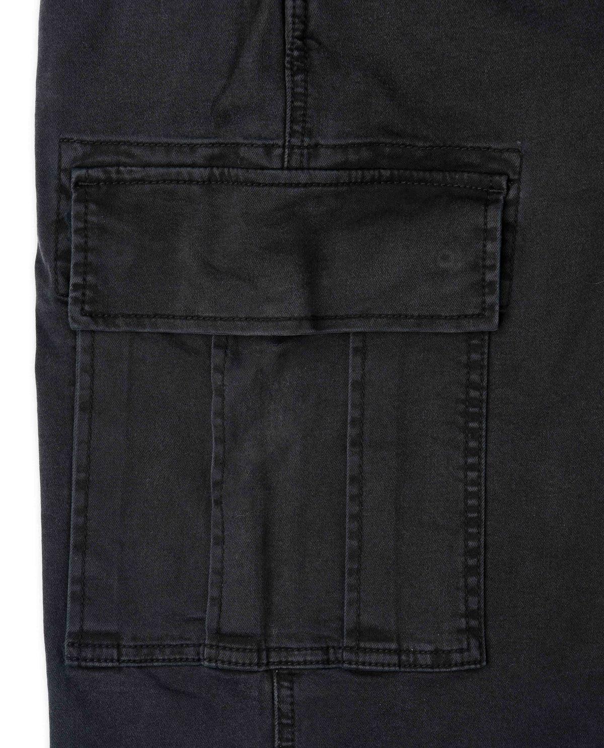 Close-up of a black pocket on a dark fabric background