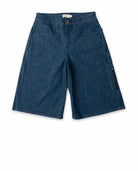 Blue denim shorts on a white background