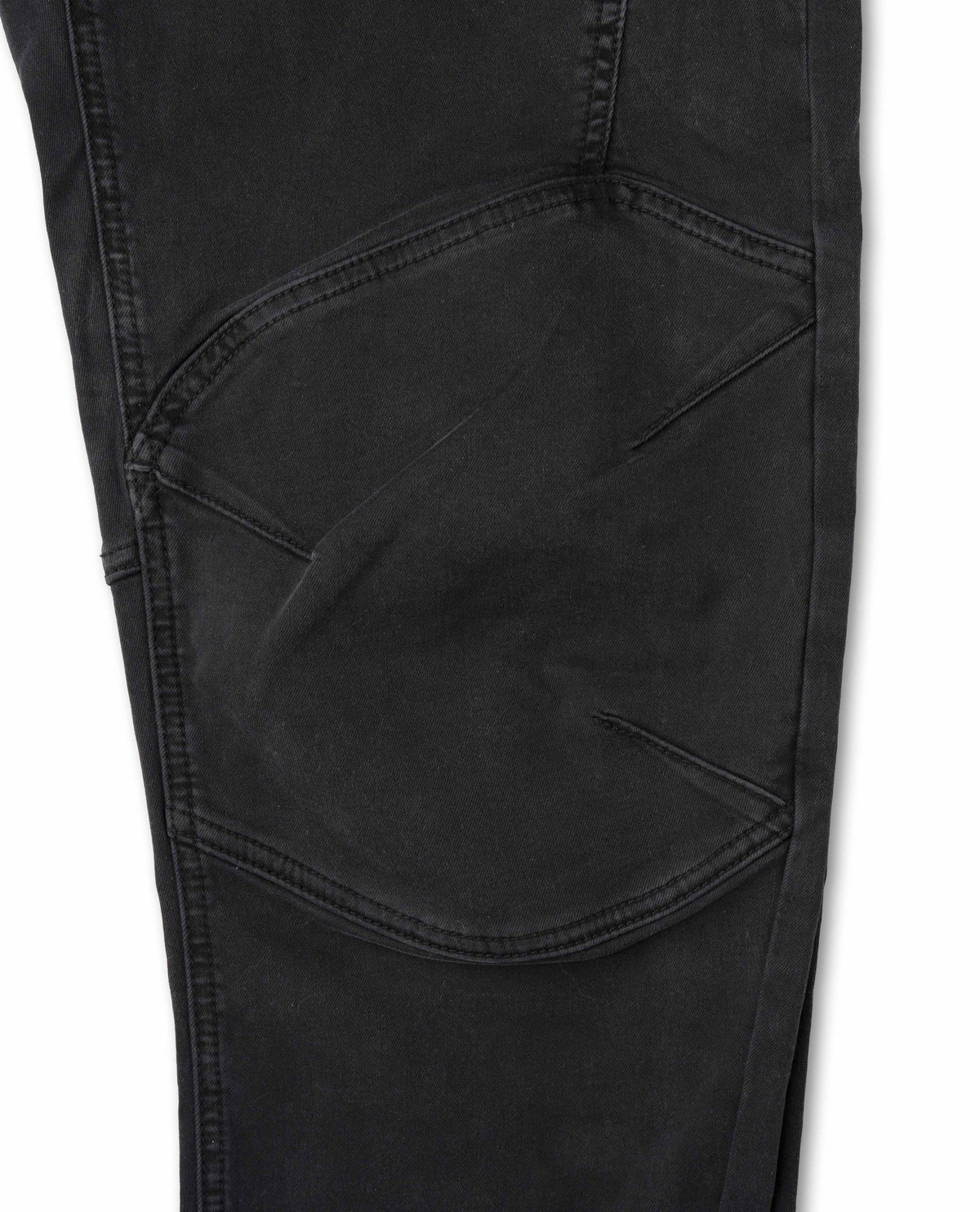 Close-up of black pants with a pocket on a white background