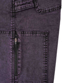Close-up of a dark gray denim pocket with stitching detail.